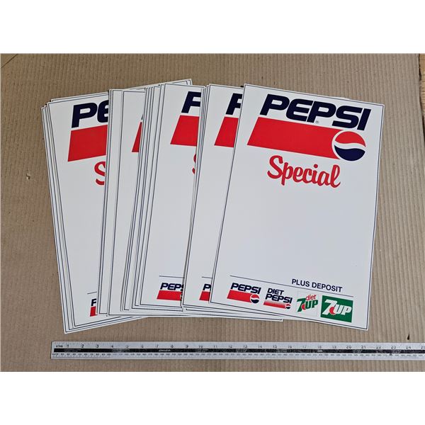 Stack of Pepsi Advertising Signs