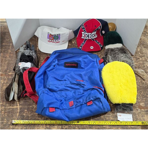 Lot of misc items- rv awning tie down, hats