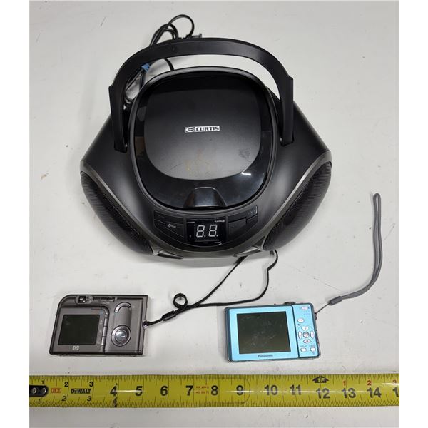 Curtis portable stereo boombox and (2) Cameras. (Untested All)