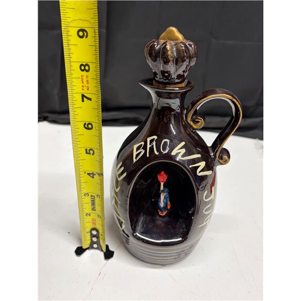 Vintage "Little Brown Jug" musical whiskey decanter.(Working) (It's wind-up and the person turns)
