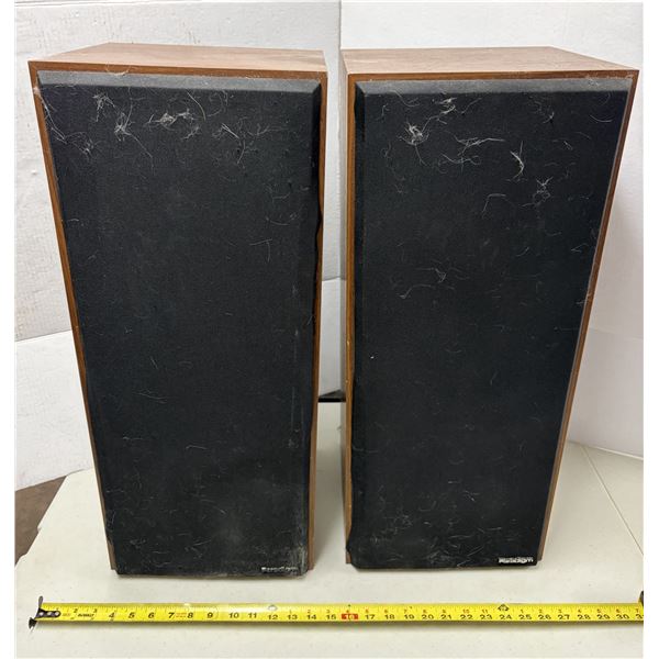 Vintage Paradigm tower speakers featuring a classic wood grain finish. (Untested)
