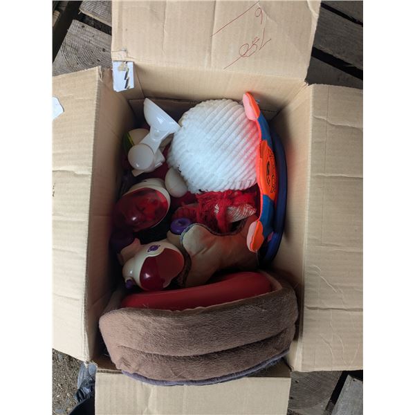 small dog bed with toys