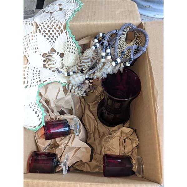 box of red decorative dishes, with home décor