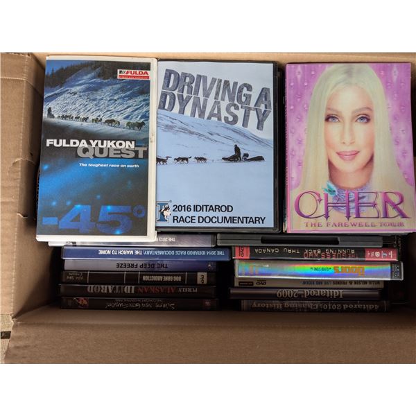 box of movies, dvds and vhs tapes