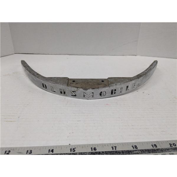 Chrome oldsmobile trim/bracket piecxe, broken ends