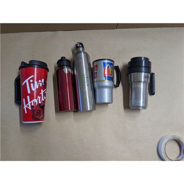 box of travel mugs and water bottles