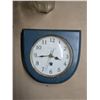 Image 2 : cordless phone, clock, decorative bottle