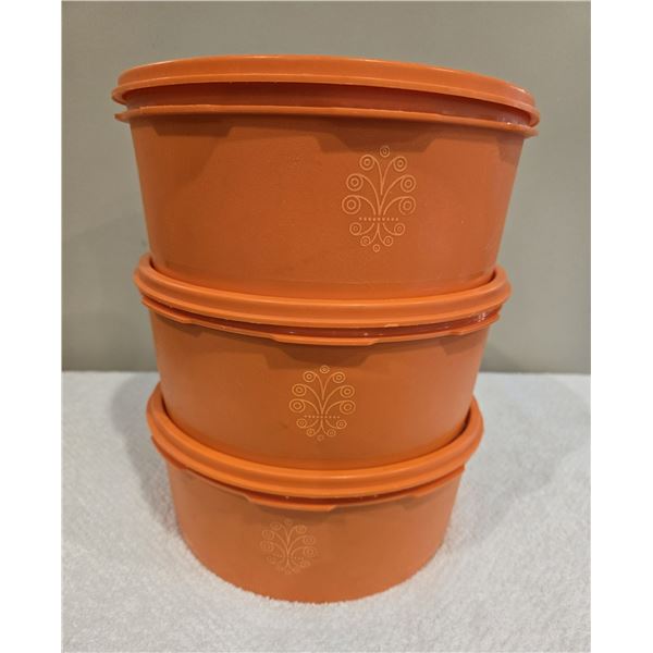 Set of 3 vintage Tupperware Servalier canisters with lids. Bright tangerine orange, 1205-3.  Like ne