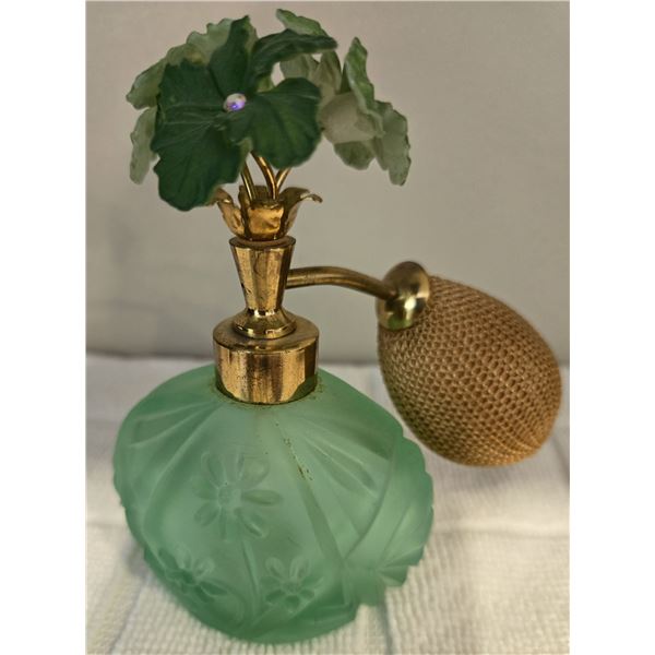 Vintage frosted green glass perfume bottle, embossed floral design with atomizer.  L.W. Rice sticker