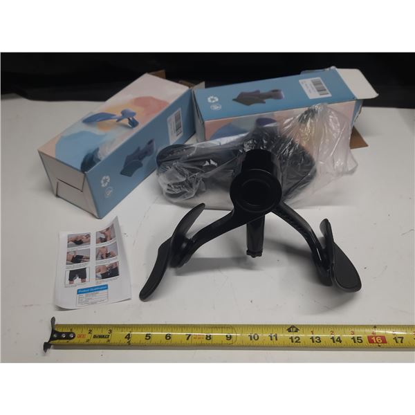 (2) black, adjustable Kegel pelvic floor muscle trainer designed to strengthen the inner thighs, hip