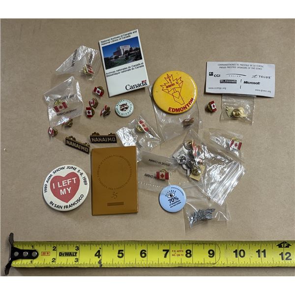 This collection features various pins related to Canadian history and geography, including several "