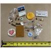 Image 1 : This collection features various pins related to Canadian history and geography, including several "