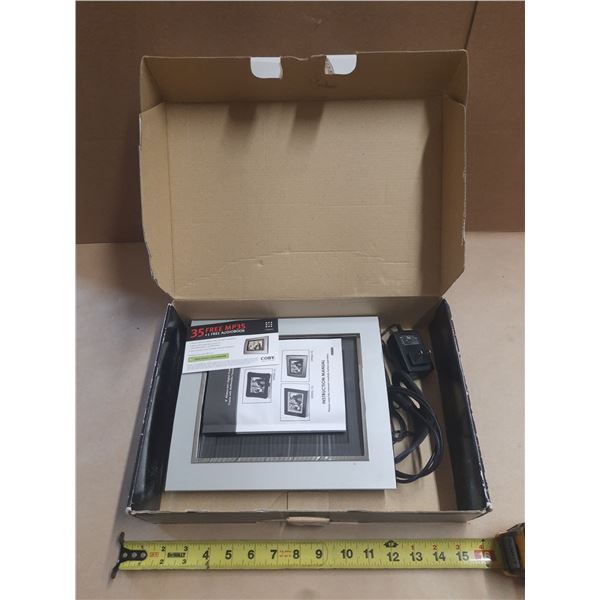 Coby DP854-1G digital photo frame features multiple card slots, including SD, MMC, MS, xD, and CF. (