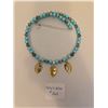 Image 1 : Teal and Silver Necklace with Gold Plate and Cross Charms