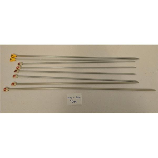 Eight Knitting Needles: 2 X 3.5 mm, 4 X 10 mm, 2 X 9 mm