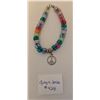 Image 1 : Multicolored Bracelet with Peace Charm