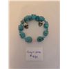 Image 1 : Teal Skull Shaped Beaded Bracelet with Skull Charms