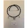 Image 1 : Black and Silver Necklace with Cowboy Boot and Hat Charms