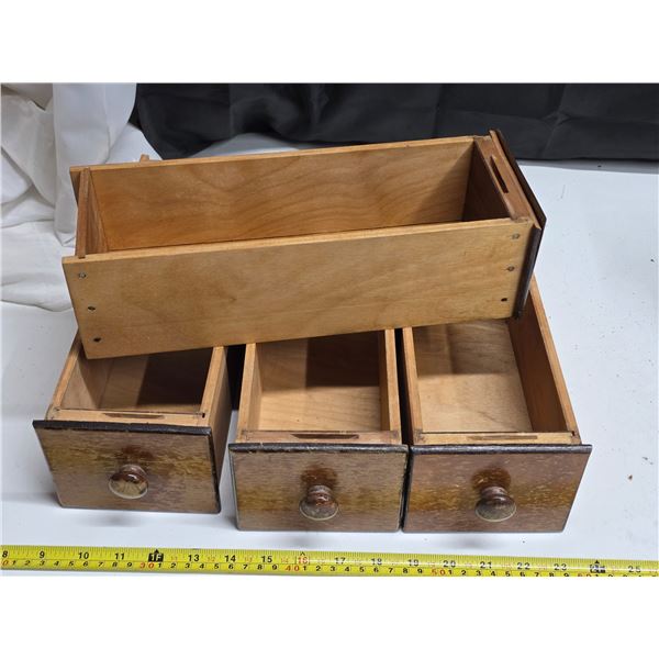 4 sewing machine drawers