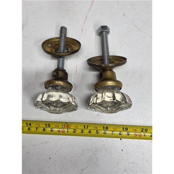 2 glass door knobs