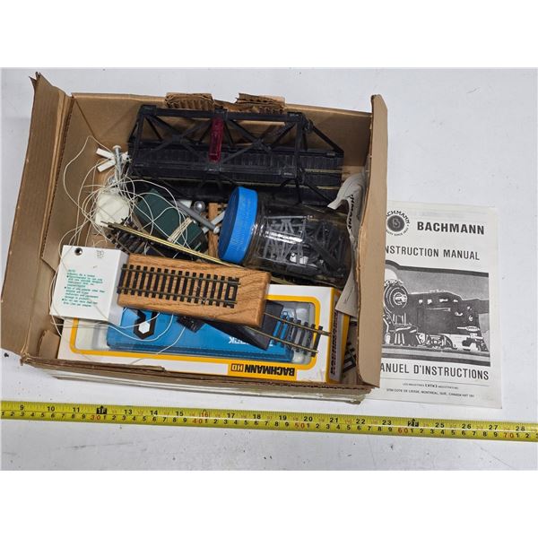 Box of HO railroad parts