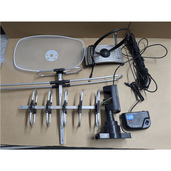 rotating TV antenna with signal booster