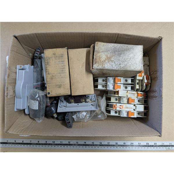 box of electrical supplies, breakers, actuators, regulators, etc