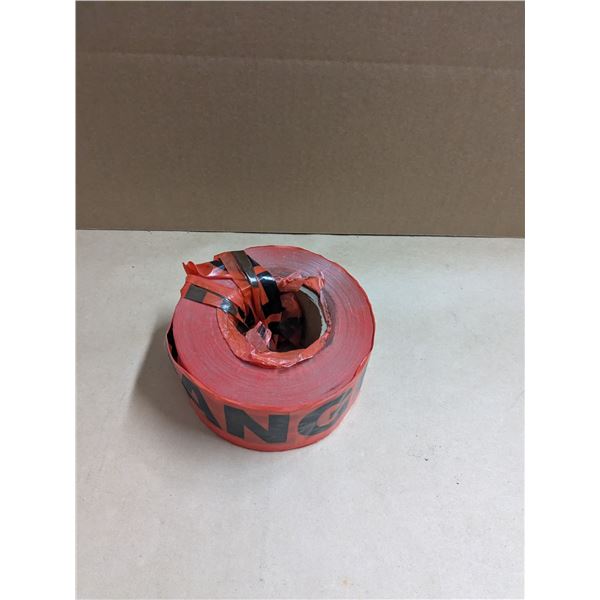 Red "danger" tape, 3", partial roll