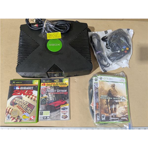 X-box 1st gen, with cords and controller. Plus games and xbox 360 games, and cords. With sports card