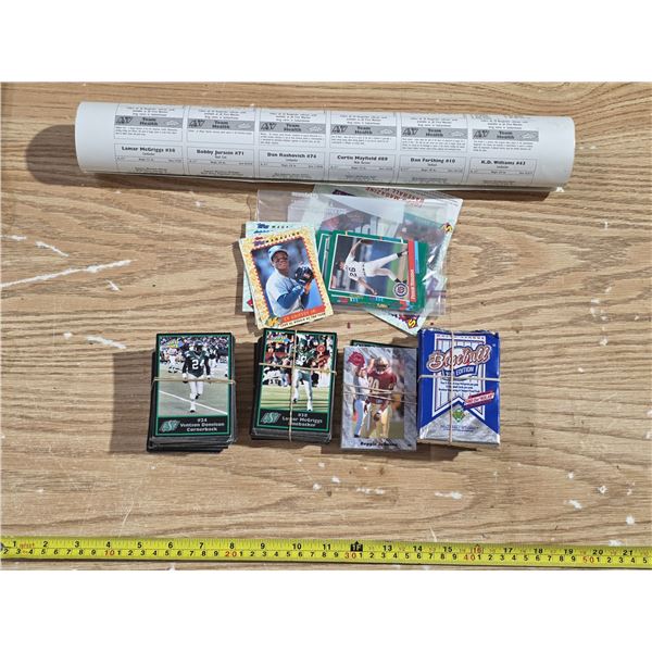 Football and baseball cards with football poster