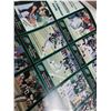 Image 4 : Football and baseball cards with football poster