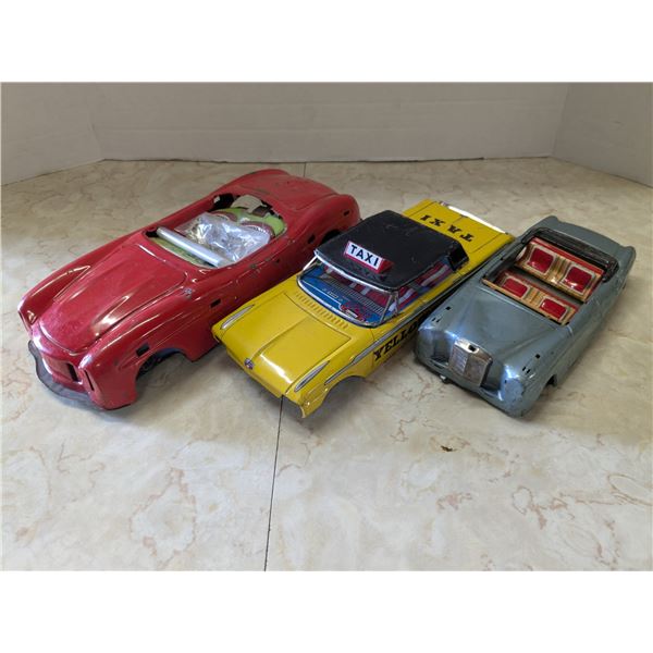 3 vintage toy car bodies