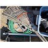 Image 4 : Pallet of items- rake, garden hose, totes, skates