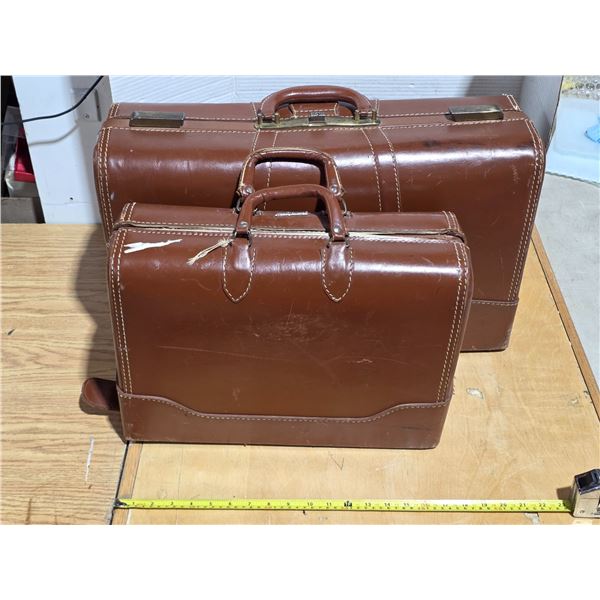 2 vintage travel suit cases