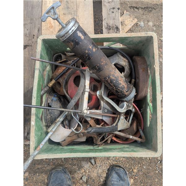 vintage milk crate full of tools and tool parts