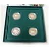 Image 3 : 1999 Royal Canadian Mint "Cats of Canada" sterling silver coin set featuring four 50-cent coins.
