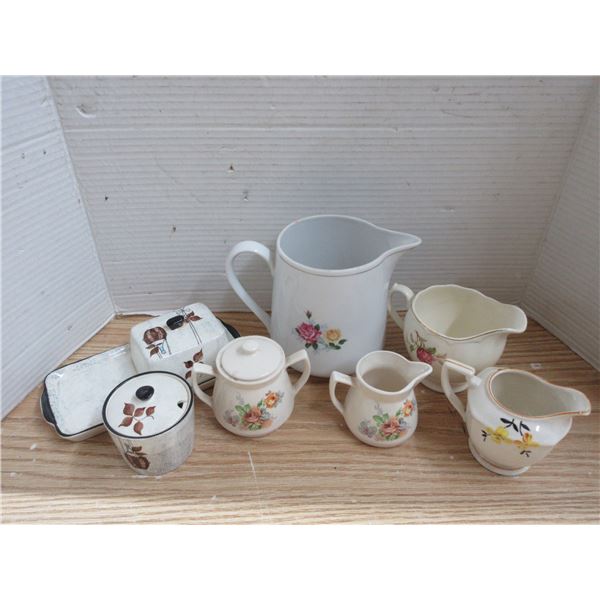 Lot Pitcher, Butter Dish, and Sugar Container