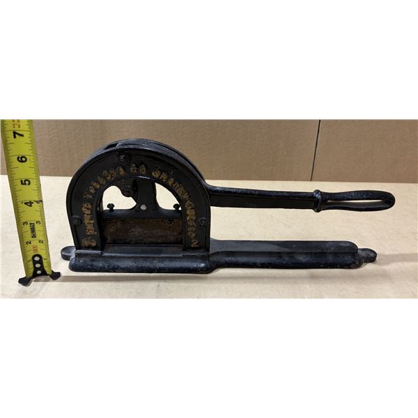 Antique cast iron tobacco plug cutter manufactured by the Empire Tobacco Co. in Granby, Quebec.