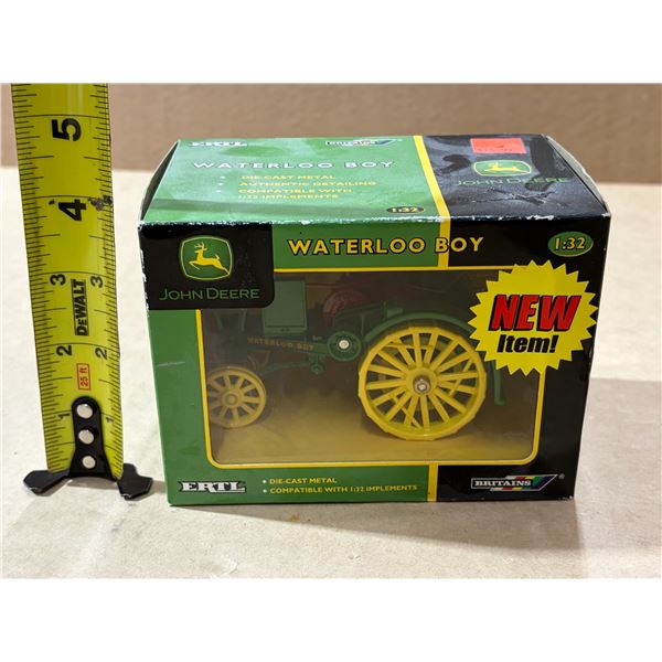 John Deere Waterloo Boy tractor is a die-cast metal collector item.