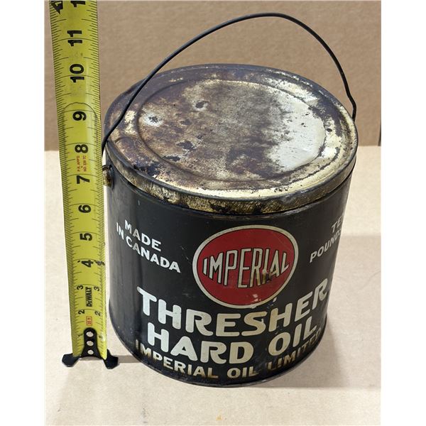 Vintage "Imperial Thresher Hard Oil" grease tin from Canada, likely dating from the 1920s. (Empty)