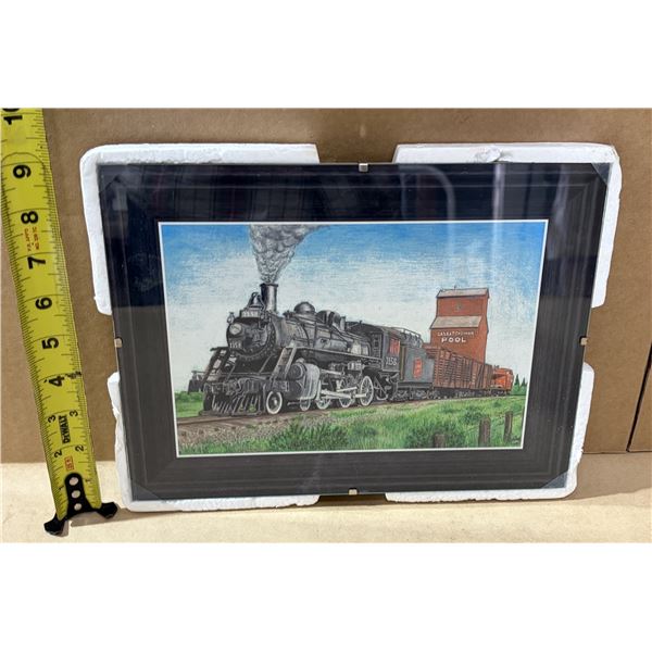 "Saskatchewan Pool" grain elevator and a steam locomotive, possibly a "Panclox" branded item.