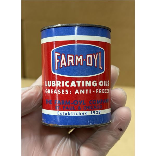 Vintage 1930s-era Farm-Oyl company metal piggy bank.