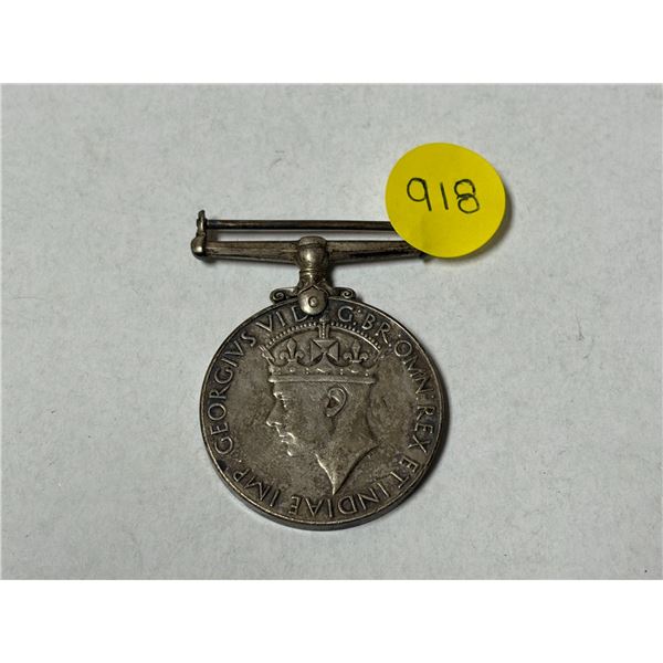 British World War II 1939–1945 War Medal featuring the effigy of King George VI. (Descripti
