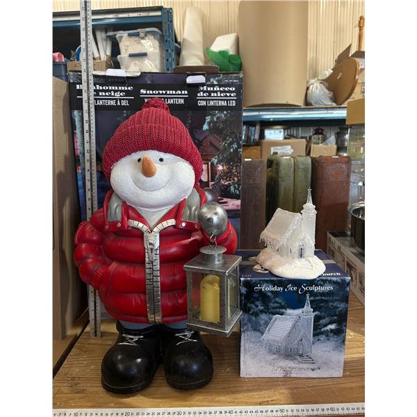 24 inch tall snowman with LED lantern and 7.5 inch tall ice church decoration