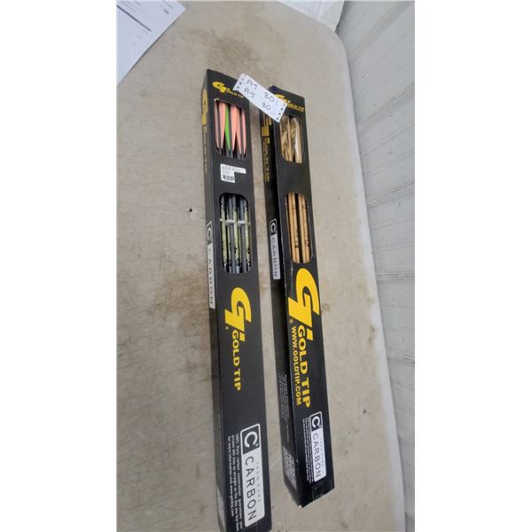 Two Packs of Gold Tip 100% Pure Carbon Arrows with Plastic and Feather Fletchings