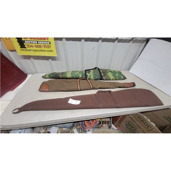 Three Soft Gun Cases: Brown Canvas, Tan Canvas with Leather Accents, and Camouflage