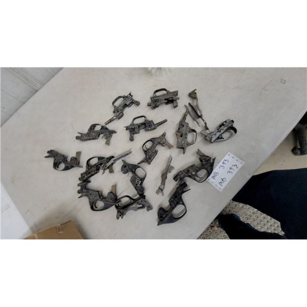 Assorted Disassembled Firearm Frames, Receivers, and Trigger Assembly Parts
