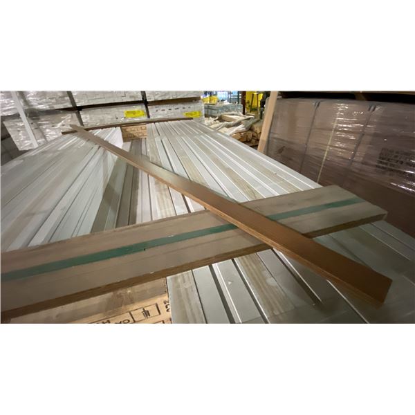 1 SMALL LIFT OF TRIM MOULDING WITH NON-EMBOSSED URBAN FIR FINISH APPROX 7' LENGTHS, 571 FT TOTAL