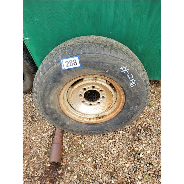 265/75R16 tire on 8-hole rim,  fits Chevy