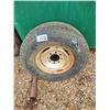 Image 1 : 265/75R16 tire on 8-hole rim,  fits Chevy